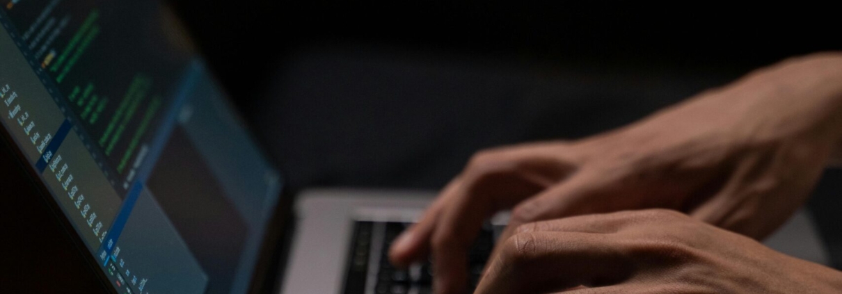 person-using-silver-and-black-laptop-computer