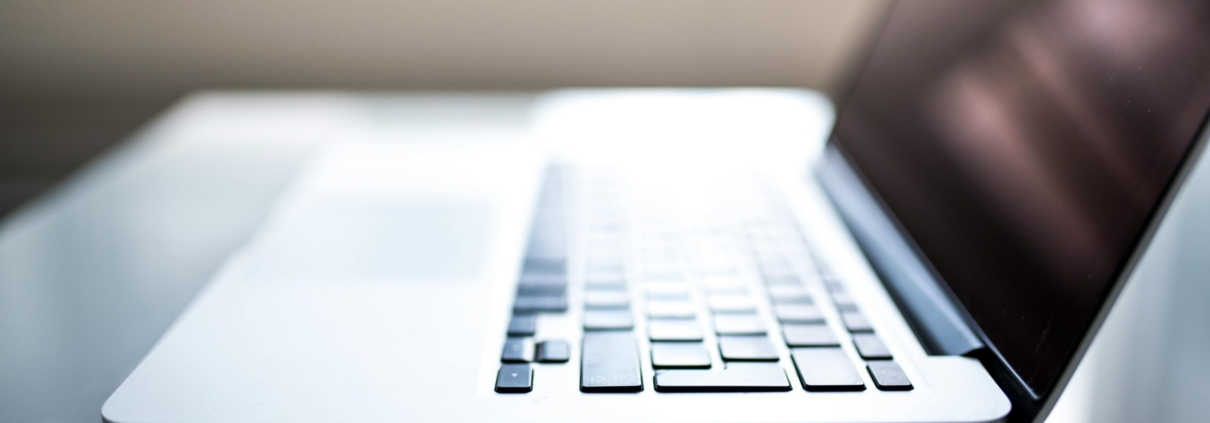 shallow-focus-photography-of-macbook